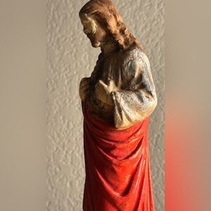 Antique Religious statue depicting the Sacred Heart of Jesus.